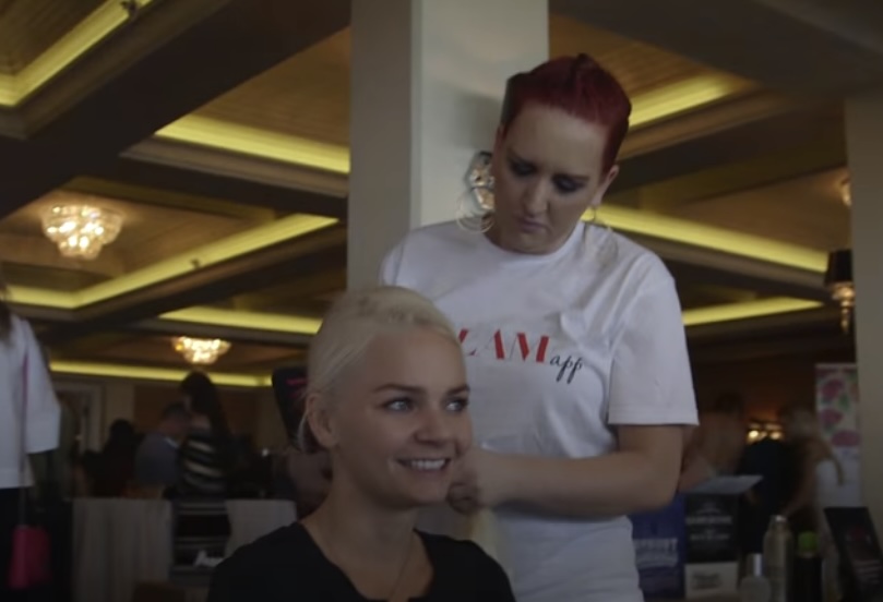 hairstylist styling hair